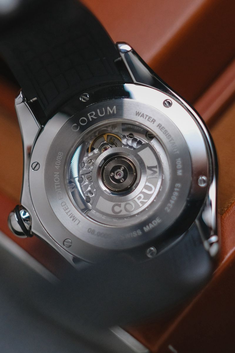 ขายนาฬิกา Corum Bubble 47 Luminova Limited 88 open caseback shows automatic movement