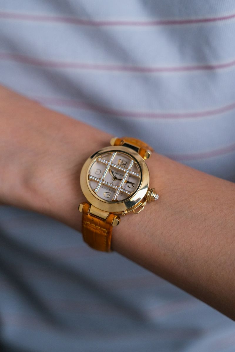 นาฬิกามือสอง Cartier Pasha Gold 18K Diamonds Grille on wrist