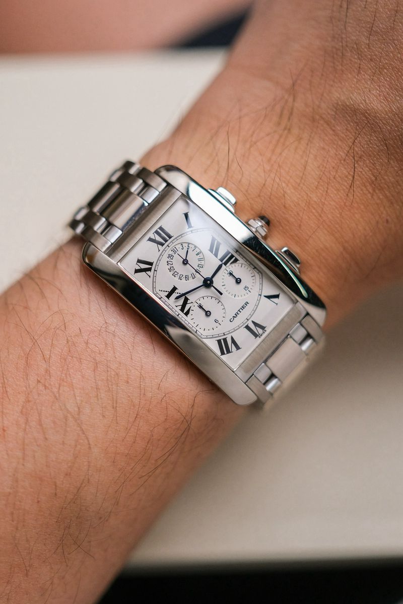 นาฬิกา Cartier Tank Américaine Chronograph Full 18K White Gold Ref W26033L1 on wrist