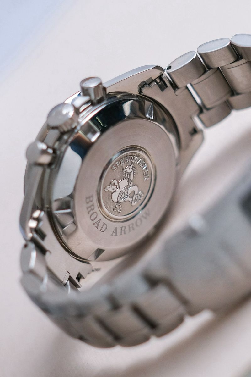 รับซื้อนาฬิกา OMEGA Speedmaster Broad Arrow Olympic Collection Melbourne 1956
