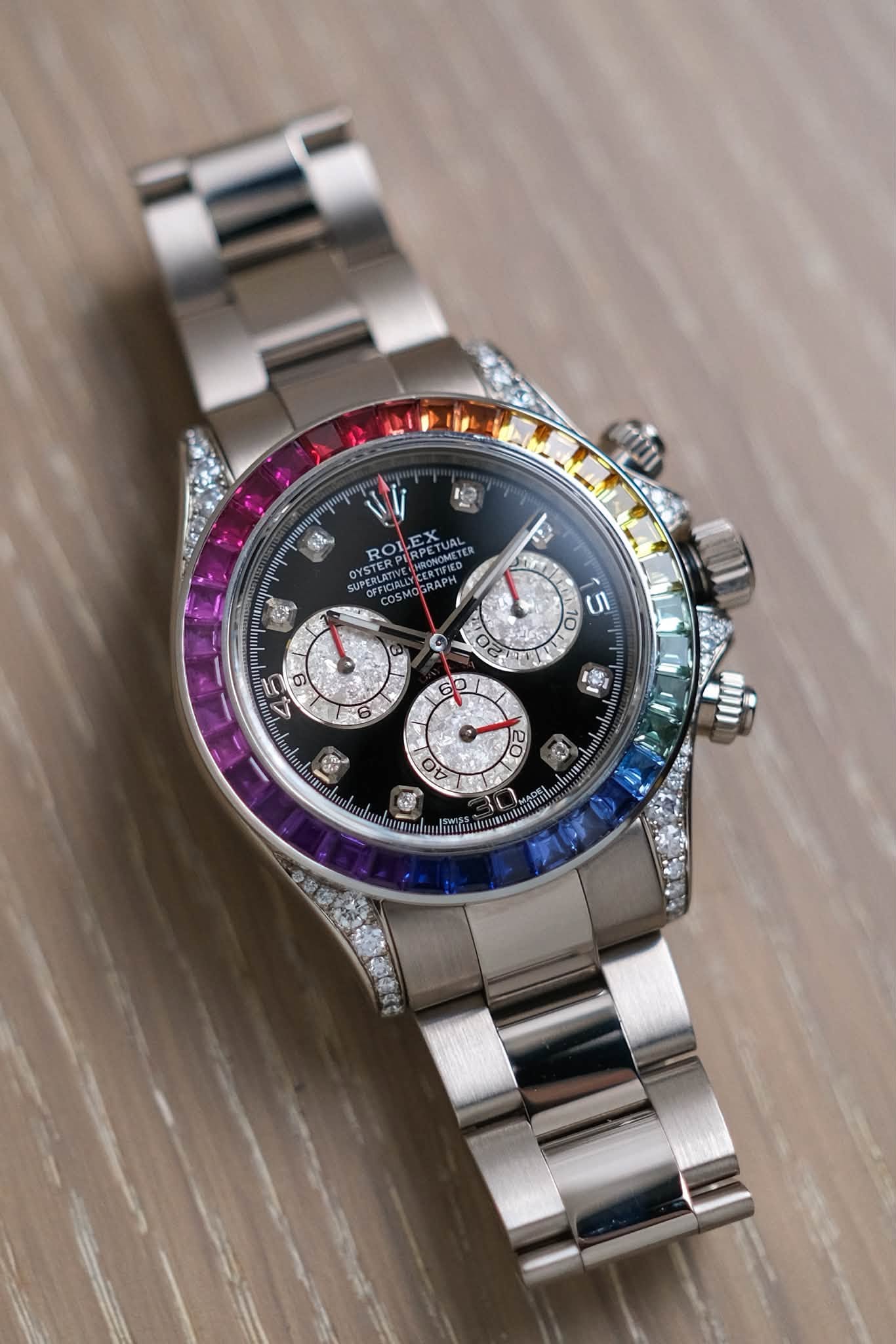 รับซื้อนาฬิกา Rolex Cosmograph Daytona Rainbow 18K White Gold