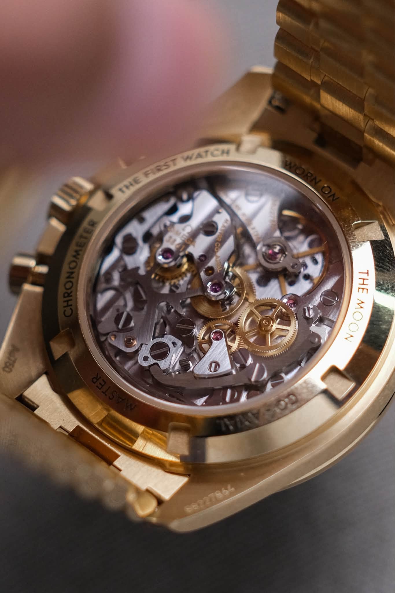 รับซื้อนาฬิกา Omega Speedmaster Moonwatch Professional 18K Moonshine™ Gold Green Dial 310.60.42.50.10