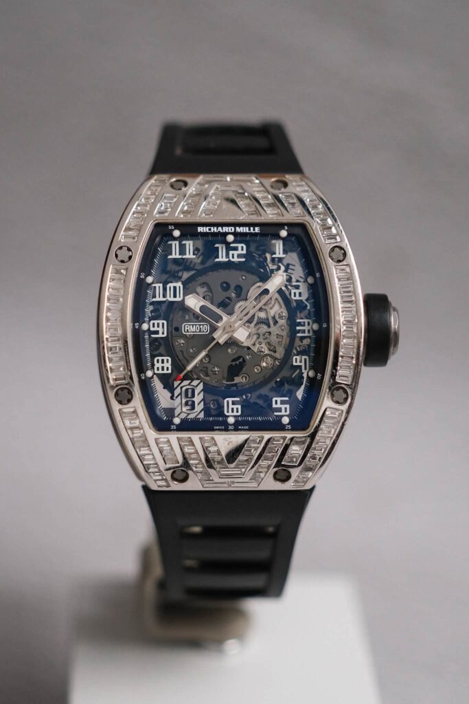 รับซื้อนาฬิกา Richard Mille RM 010 Automatic Titanium (RM010 AM Ti) Full Baguette Diamond Custom Set